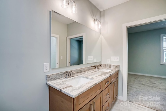 bathroom featuring tile patterned floors and vanity