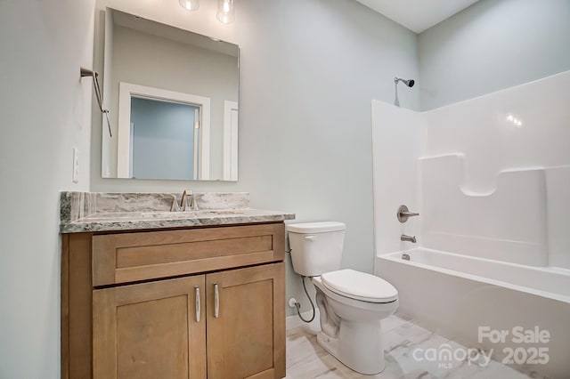 full bathroom with shower / tub combination, vanity, and toilet