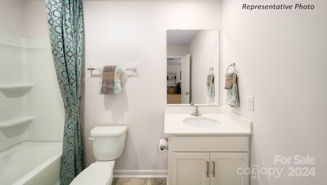 full bathroom featuring vanity, toilet, and shower / bathtub combination with curtain