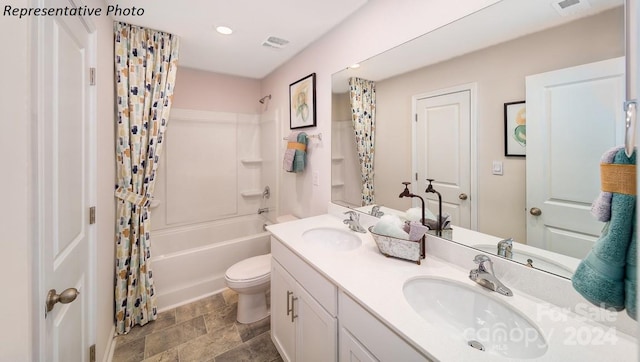 full bathroom with vanity, shower / bath combination with curtain, and toilet