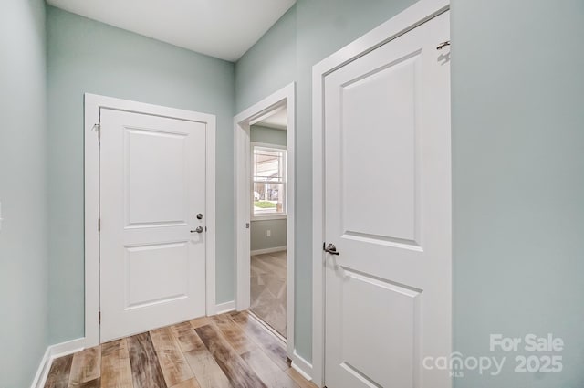 entryway with light hardwood / wood-style flooring