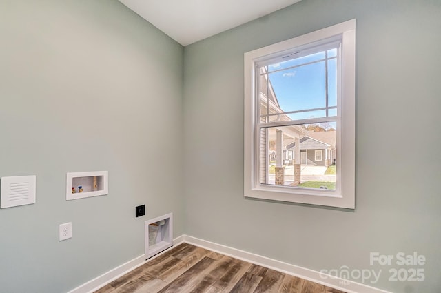 laundry room with washer hookup, hardwood / wood-style flooring, and electric dryer hookup