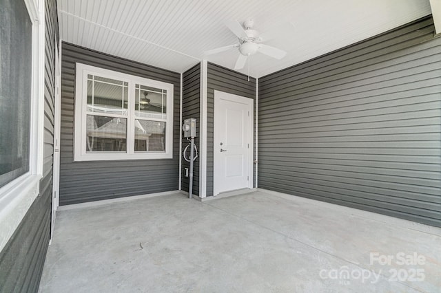 exterior space featuring ceiling fan