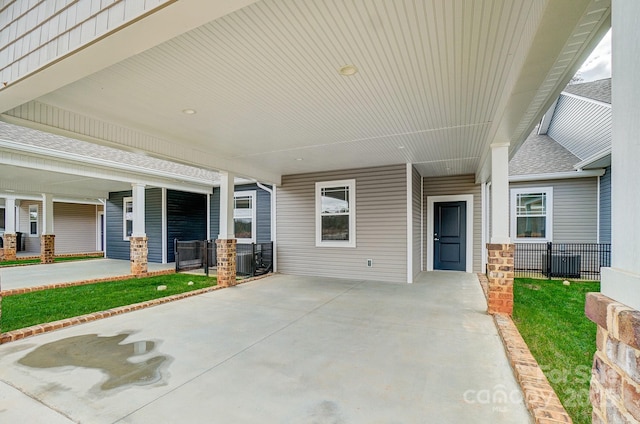 view of patio / terrace featuring a carport