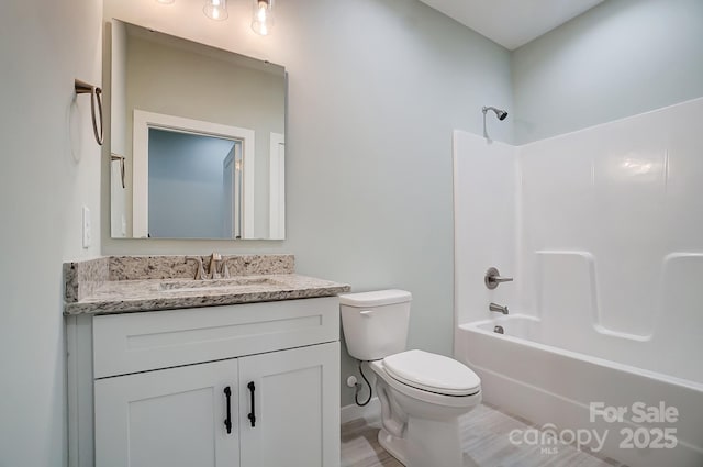 full bathroom with vanity, toilet, and shower / bath combination