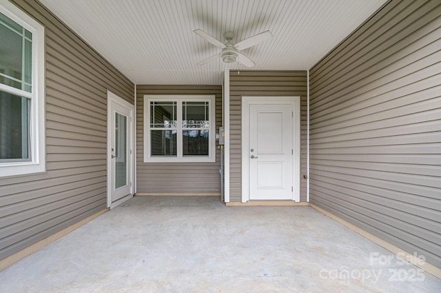 exterior space featuring ceiling fan and a patio