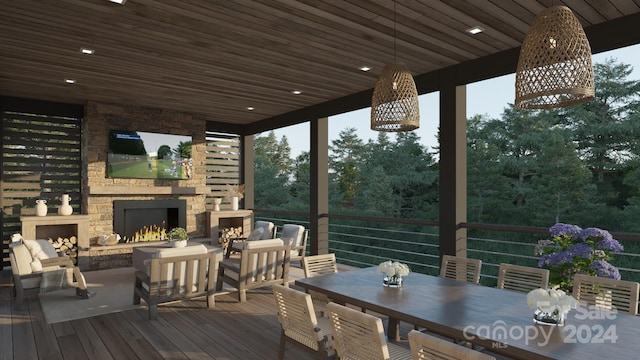 wooden deck with an outdoor living space with a fireplace