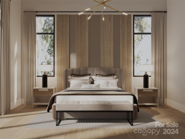 bedroom featuring a chandelier