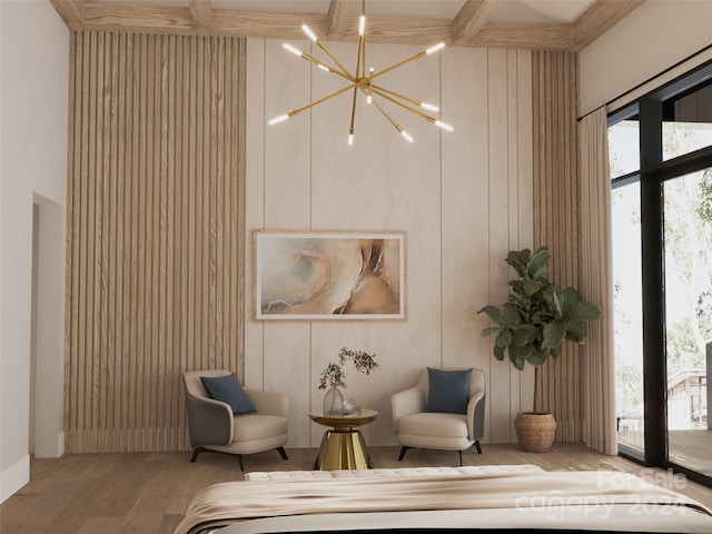 bedroom with wood-type flooring, a notable chandelier, access to outside, and multiple windows