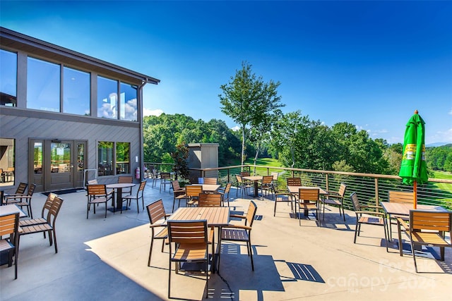 view of patio / terrace with a balcony