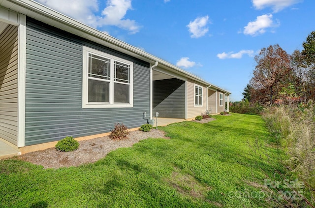 view of home's exterior featuring a lawn