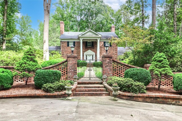 view of neoclassical home