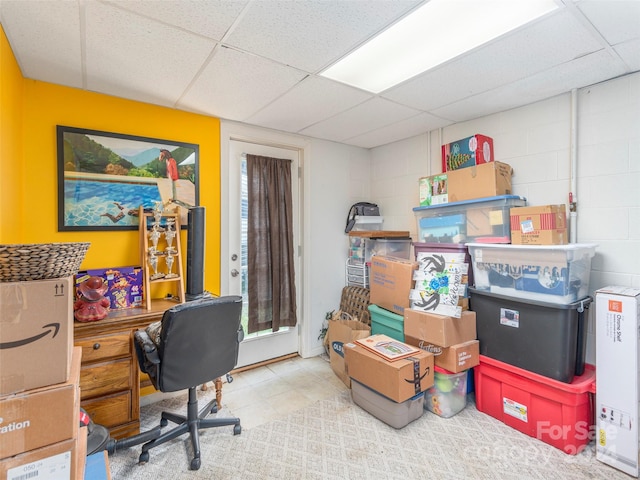 office with a paneled ceiling