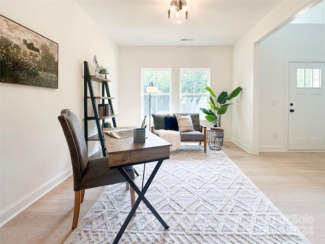 office space featuring light hardwood / wood-style floors