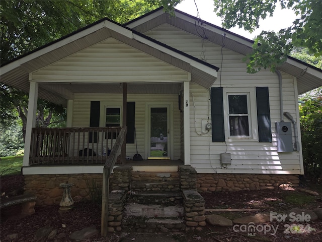 bungalow-style home with a porch