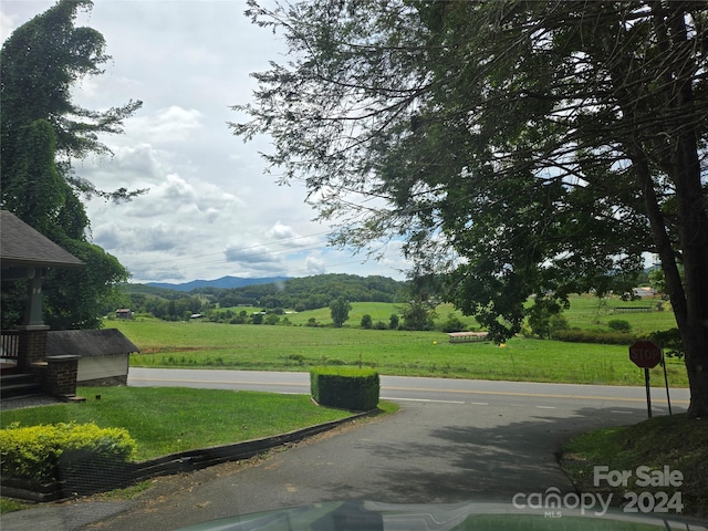 exterior space featuring a mountain view and a rural view