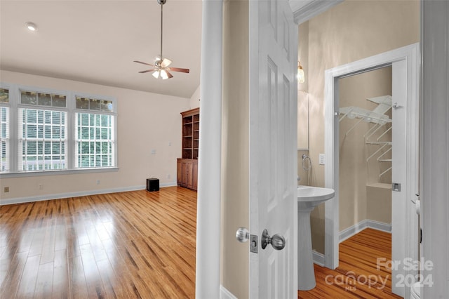 corridor featuring light hardwood / wood-style floors