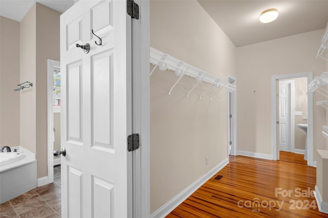 hall featuring light hardwood / wood-style flooring