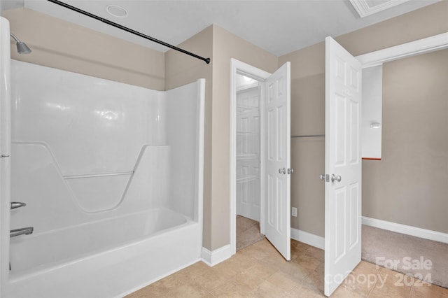 bathroom with shower / bathing tub combination and tile patterned floors