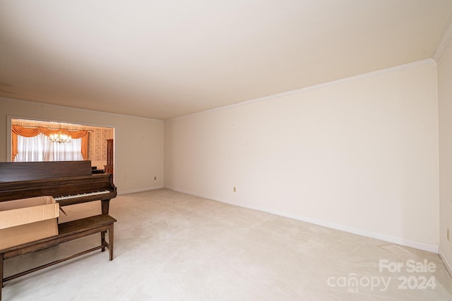 interior space with an inviting chandelier and ornamental molding