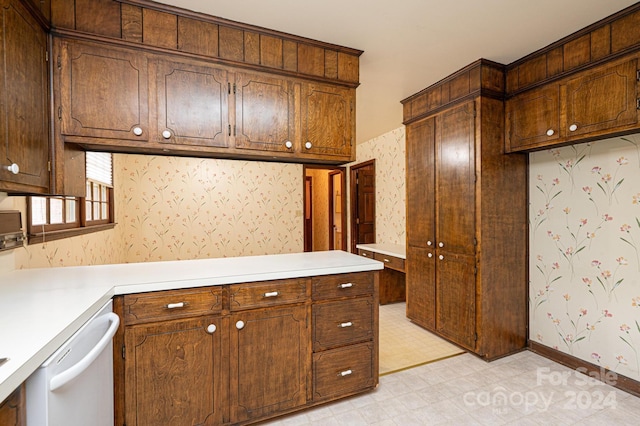 kitchen with dishwashing machine