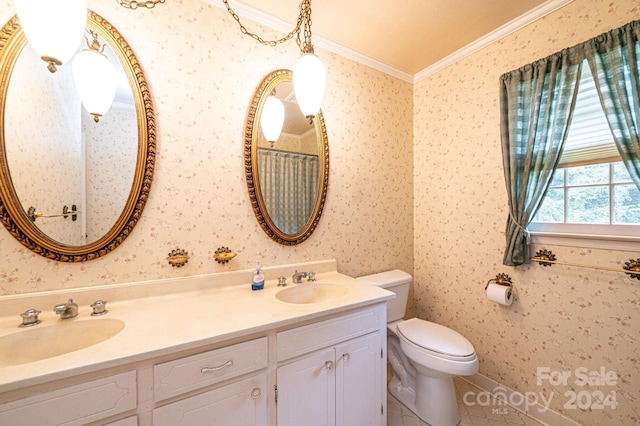 bathroom with vanity, crown molding, tile patterned floors, and toilet