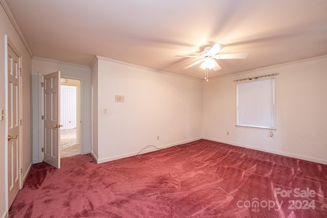 unfurnished room featuring ornamental molding, carpet, and ceiling fan