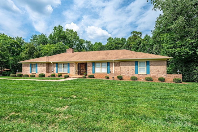 ranch-style house with a front yard