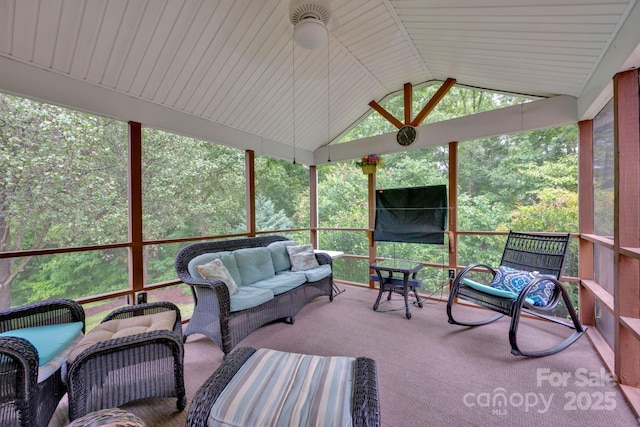 sunroom / solarium with lofted ceiling