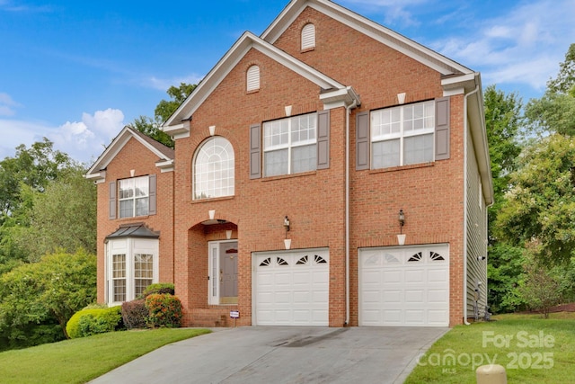 front of property featuring a garage and a front yard