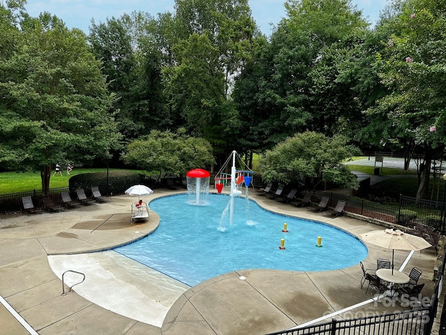 view of pool featuring a patio area