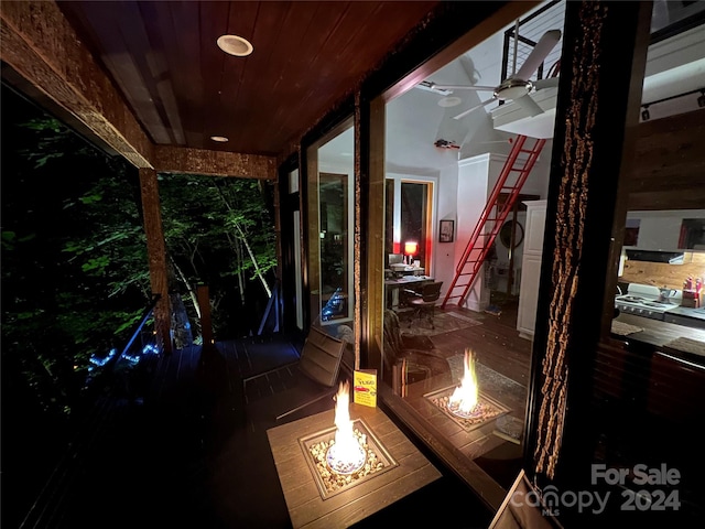 view of patio / terrace featuring an outdoor fire pit