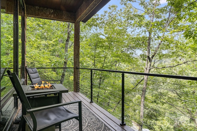 balcony featuring a fire pit