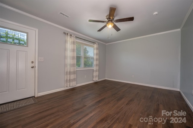 foyer with crown molding and dark hardwood / wood-style floors