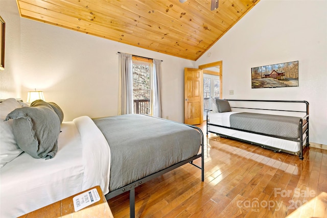 bedroom featuring high vaulted ceiling, wooden ceiling, and light hardwood / wood-style floors