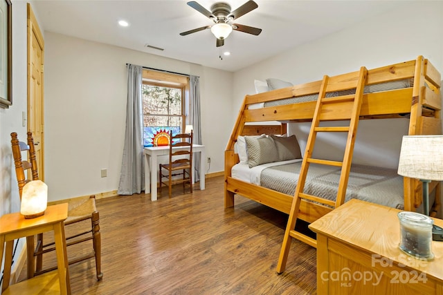 bedroom featuring ceiling fan and hardwood / wood-style floors