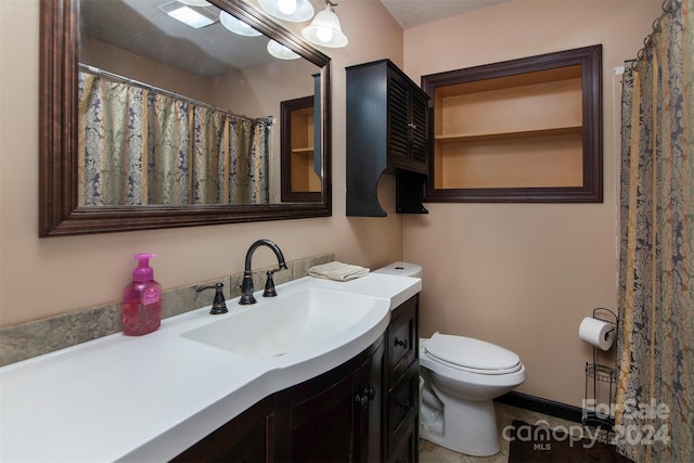 full bathroom featuring baseboards, visible vents, vanity, and toilet