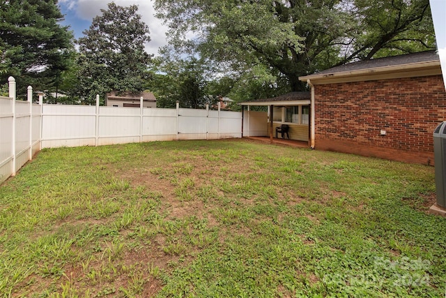 view of yard with fence