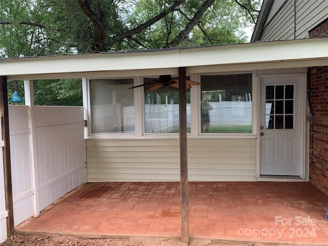 entrance to property with brick siding