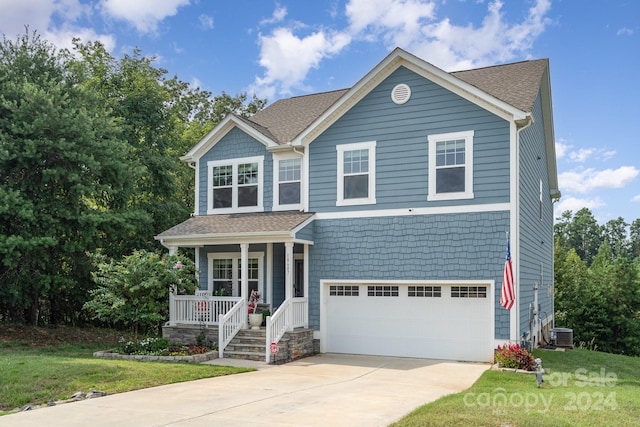 craftsman-style house with a garage, a front lawn, a porch, and central air condition unit