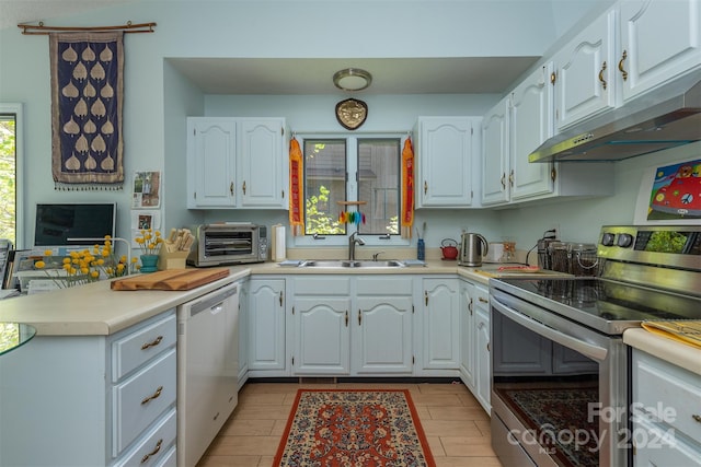 kitchen featuring white cabinetry, a sink, dishwasher, under cabinet range hood, and stainless steel electric range