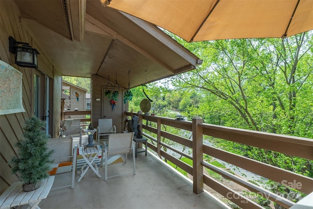 view of patio / terrace with a balcony