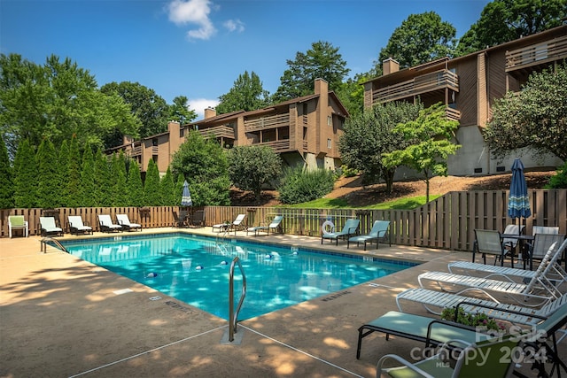 pool with a patio area