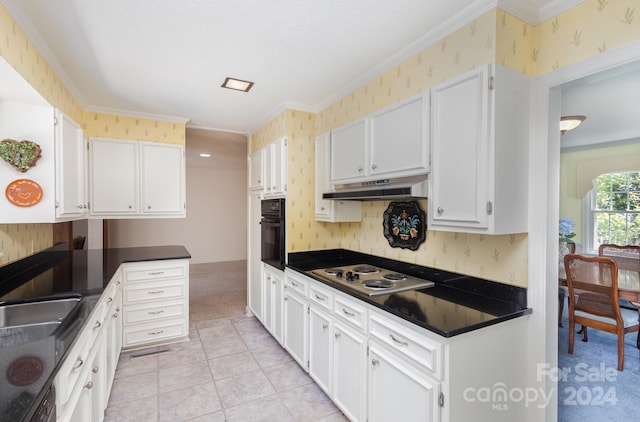 kitchen featuring white cabinetry, crown molding, oven, light colored carpet, and gas stovetop