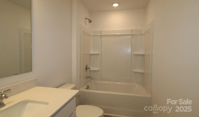 full bathroom featuring  shower combination, toilet, and vanity