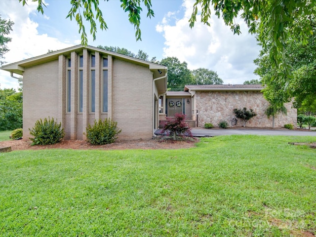 exterior space with a yard