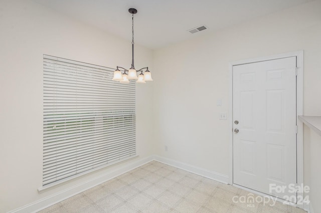 interior space with a chandelier