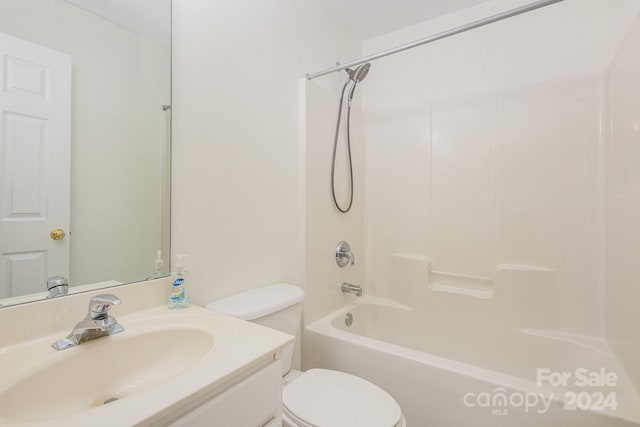 full bathroom featuring shower / washtub combination, toilet, and vanity