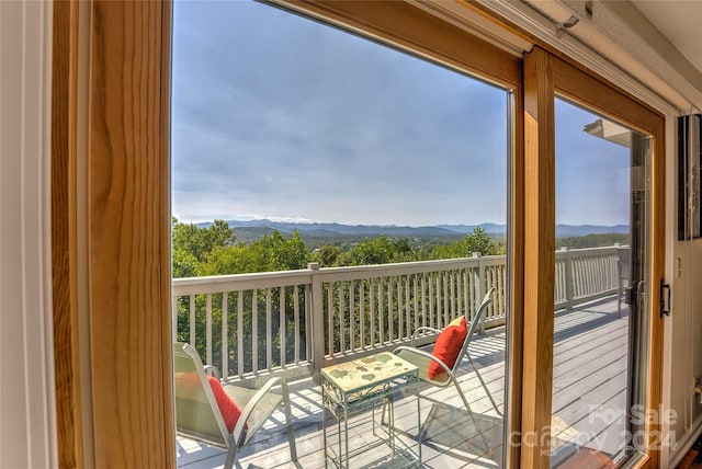 balcony featuring a mountain view