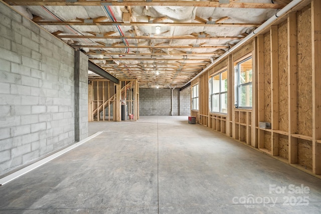 misc room with concrete flooring